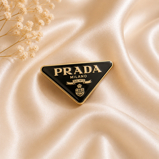 Prada brooch